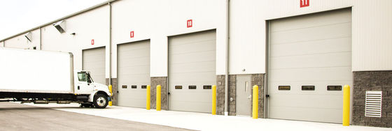 Insulated Fire Station Overhead Sectional Door Noise Reduction IP 54 Protection Class