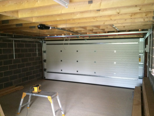 White Insulated Sectional Overhead Doors With Double-Skinned Construction Remote Control