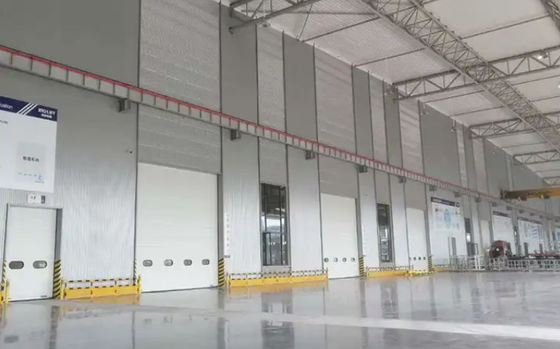 White Color Steel Sectional Door 50mm-80mm Thickness For Commercial Buildings