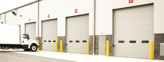 Fire Station Industrial Sectional Doors Automatic Formed With Noise Reduction And Double-skinned Door Panel