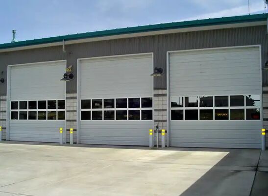 Manual Automatic foam-filled commercial sectional overhead doors Fire Station Industrial Warehouse Steel Thermal Insulated Vertical Lifting Metal Doors