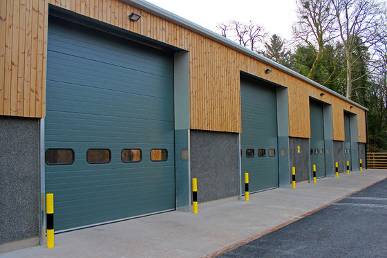 Industrial Insulated Sectional Overhead Doors Logistic Park Loading Bay