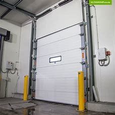 Waterproofing Automatic Industrial Sectional Door 40mm Finger Safe Panel Coated Steel