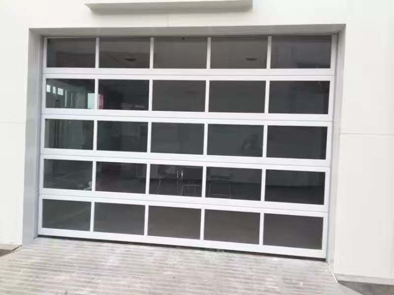 Industrial Logistic Area Loading Port 40mm Glass Garage Aluminum Sectional Door Wind Resistance Class 3 For Fire Station